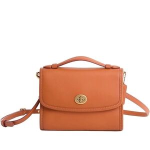 Coach Originals “Kip” Light Saddle Turnlock Leather Crossbody Bag